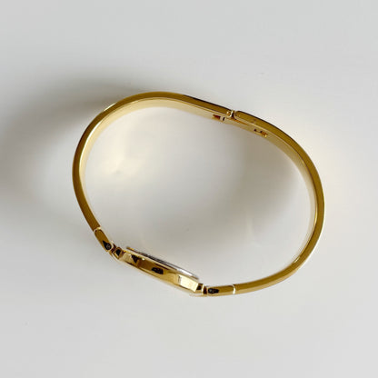 Givenchy 1990s Round Dial Gold Plated Bangle Watch