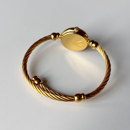 Gucci 1990s Seashell Dial Gold Plated Cable Bangle Watch