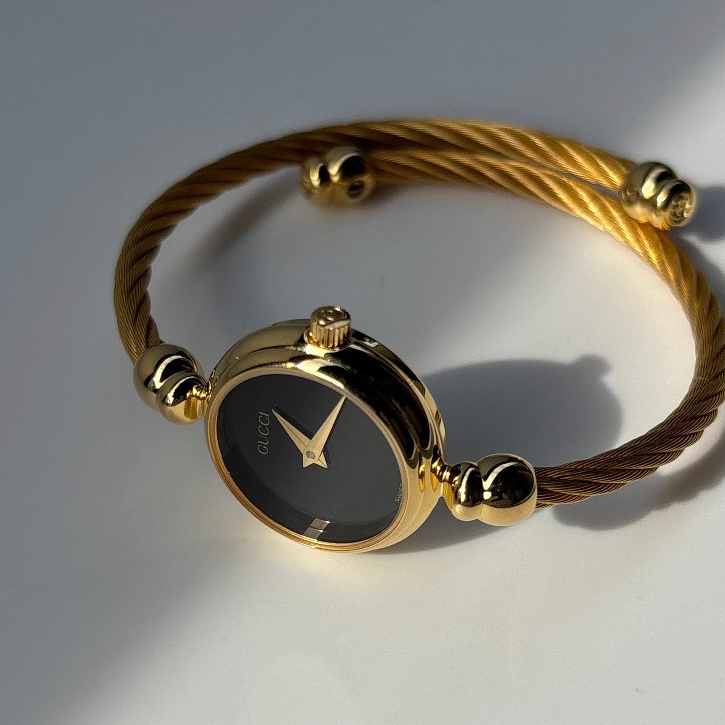 Gucci 1990s Black Dial Gold Plated Cable Band Bangle Watch