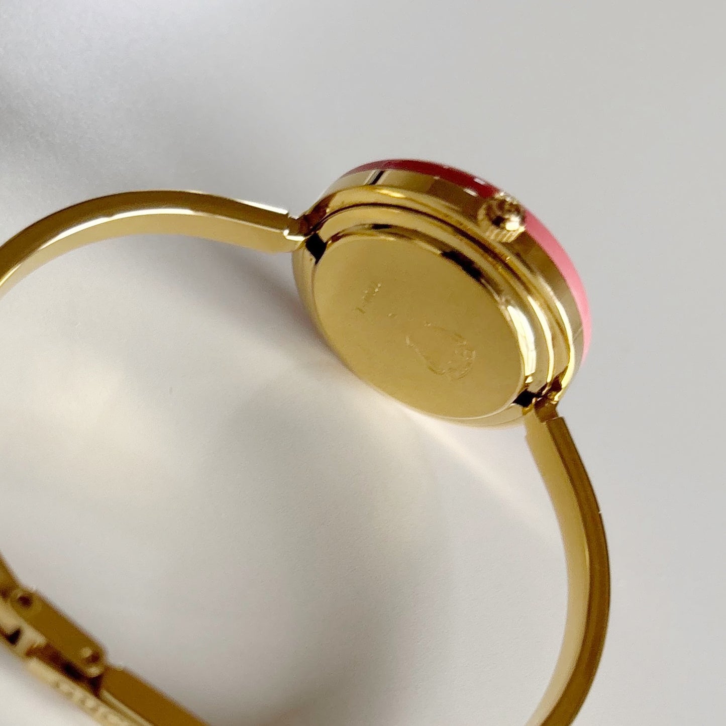 Gucci 1990s Interchangeable Bezel Gold Plated Bangle Watch with 12 bezels, case (Small)