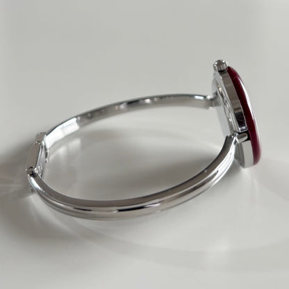 Gucci 1990s Interchangeable Bezel Stainless steel Bangle Watch with 12 bezels, case