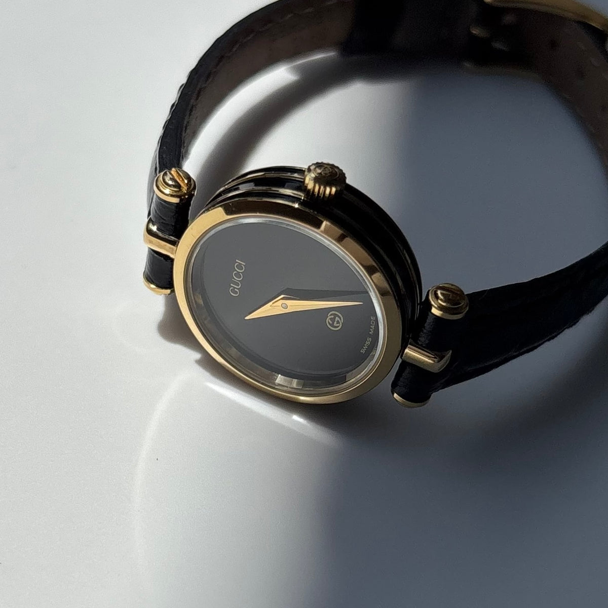 Gucci 1980s Black Dial Round Gold-Plated Watch