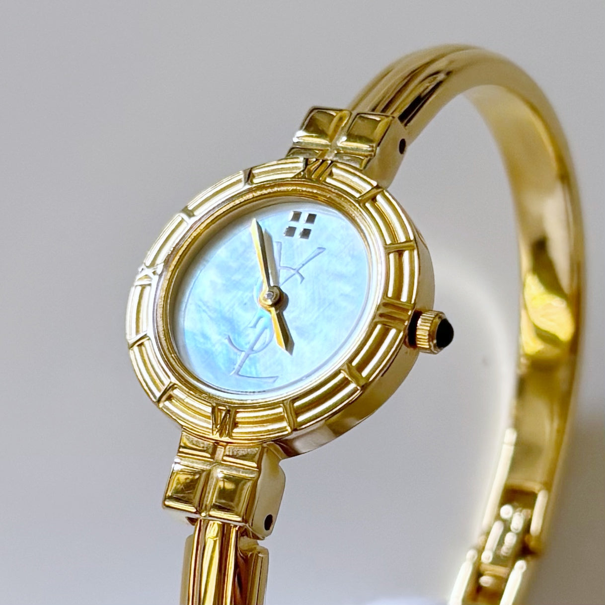 Yves Saint Laurent Seashell Dial Gold Plated Bangle Watch