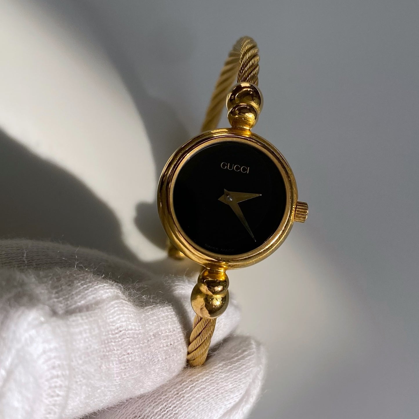 Gucci 1990s Black Dial Gold Plated Bangle Watch