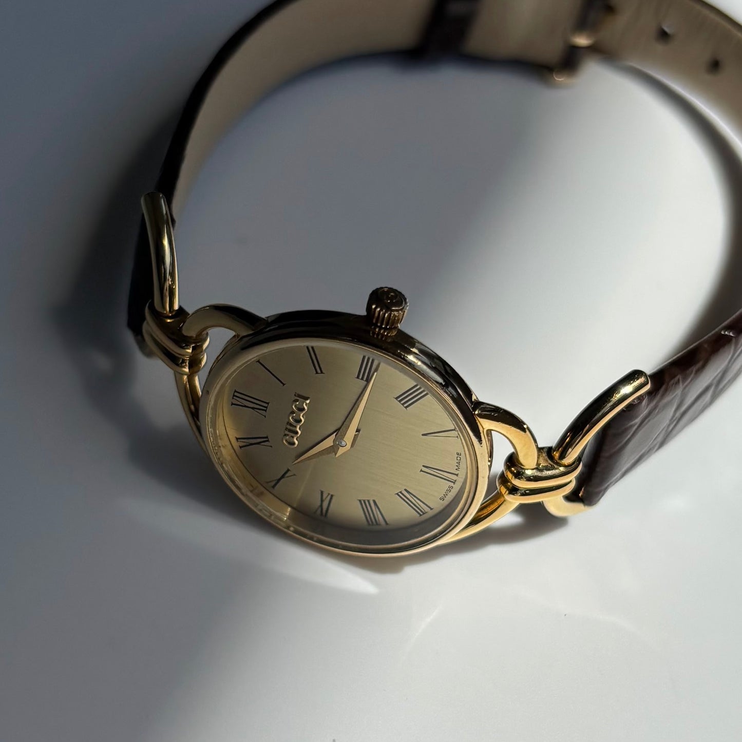 Gucci 1990s Gold Round Dial Horsebit Gold Plated Watch