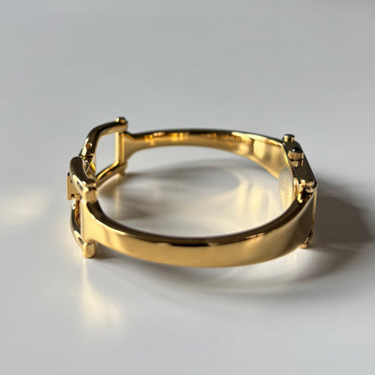 Gucci 1990s Gold Rectangular Dial Gold Plated Bangle Watch