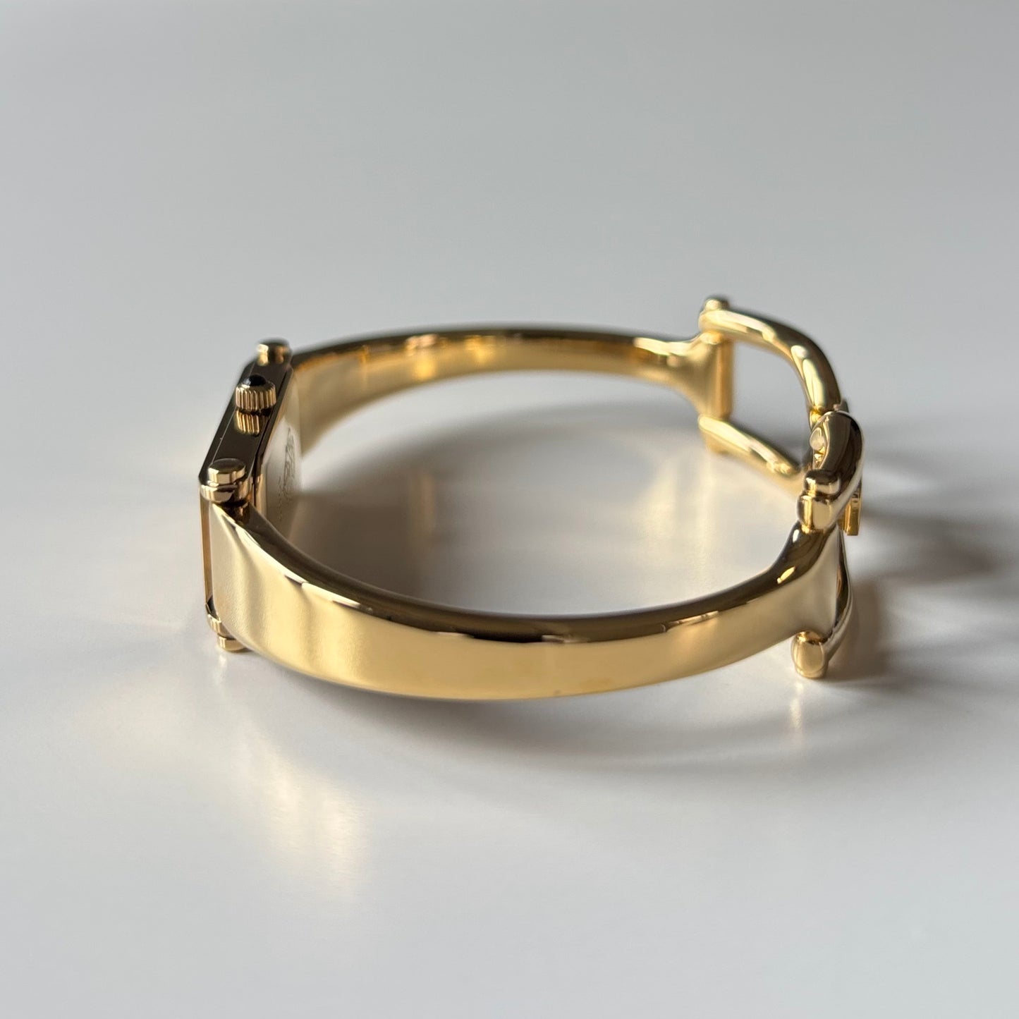 Gucci 1990s Gold Rectangular Dial Gold Plated Bangle Watch