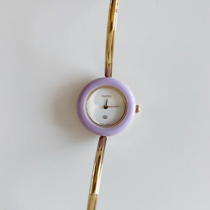 Gucci 1990s Interchangeable Bezel Gold Plated Bangle Watch with 12 bezels, case