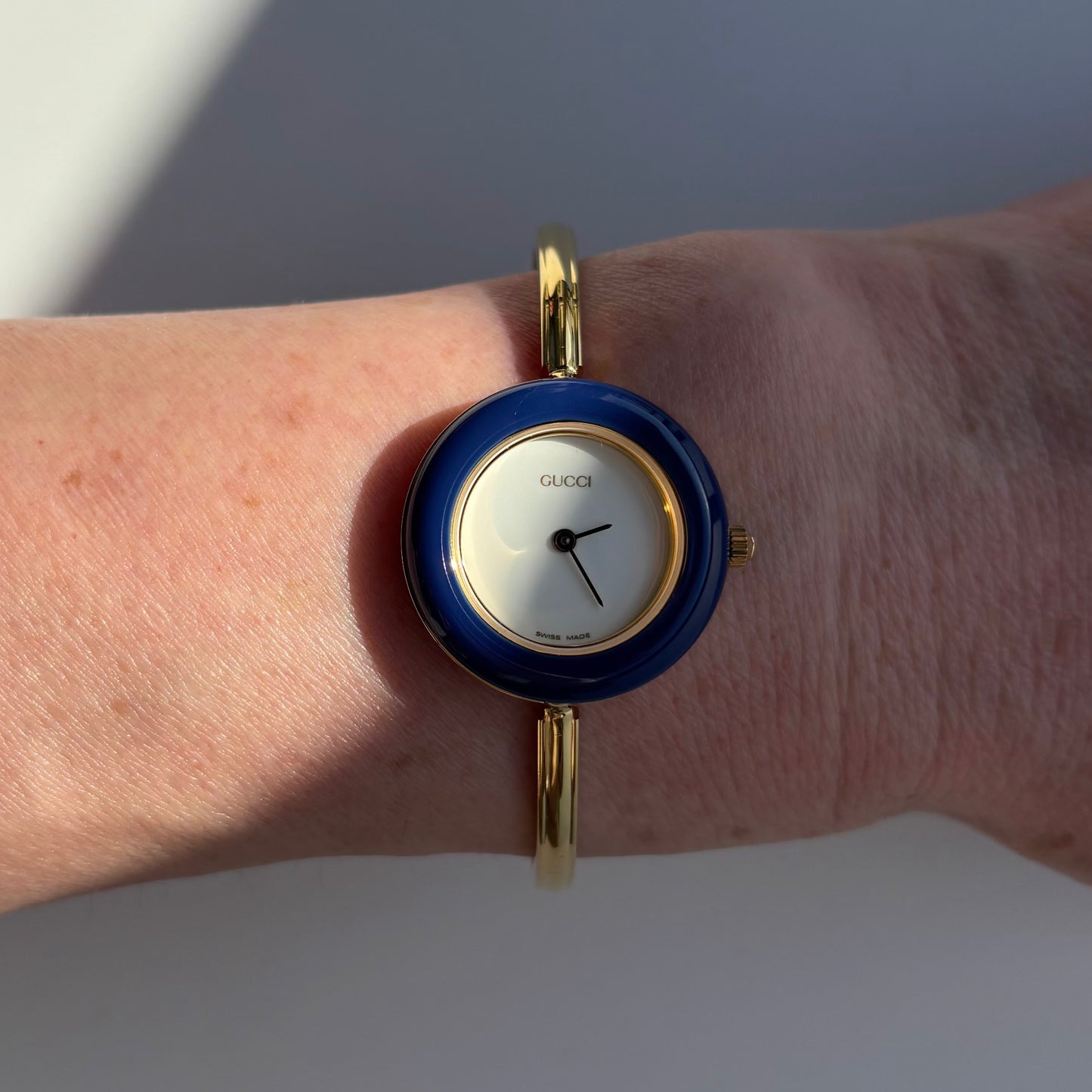 Gucci 1990s Interchangeable Bezel Gold Plated Bangle Watch with 12 bezels, case