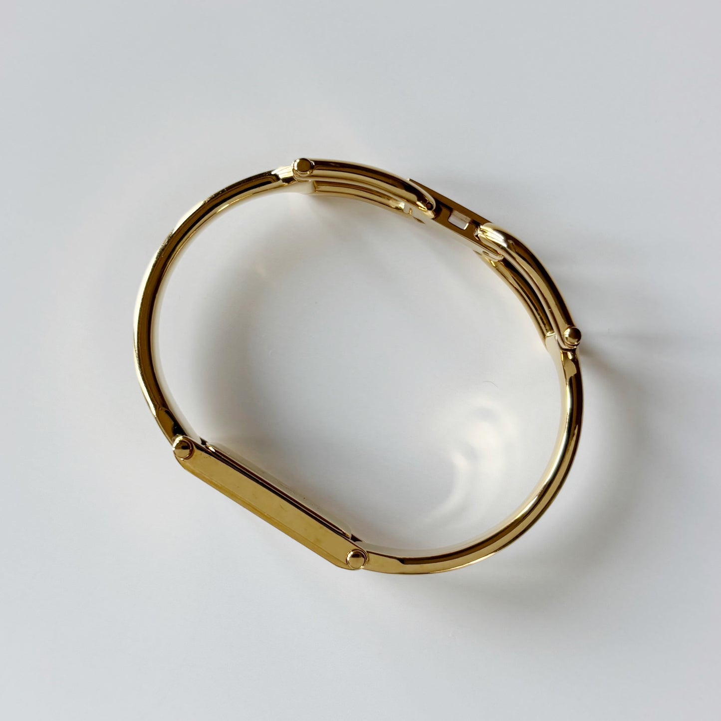 Gucci 1990s Black Dial Gold Plated Bangle Watch