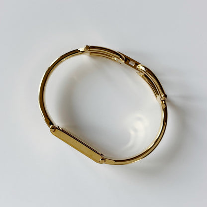 Gucci 1990s Black Dial Gold Plated Bangle Watch