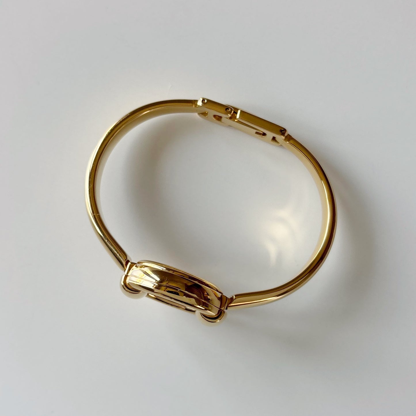 Gucci 1990s Round Dial Gold Plated Bangle Watch