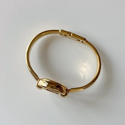 Gucci 1990s Round Dial Gold Plated Bangle Watch