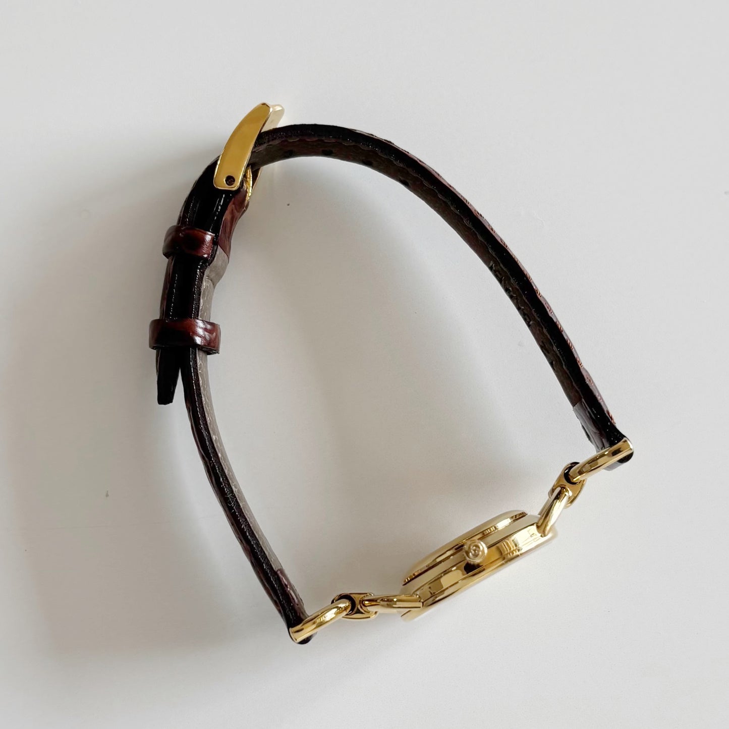 Gucci 1990s Round Dial Gold Plated Horsebit Watch