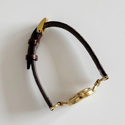 Gucci 1990s Round Dial Gold Plated Horsebit Watch