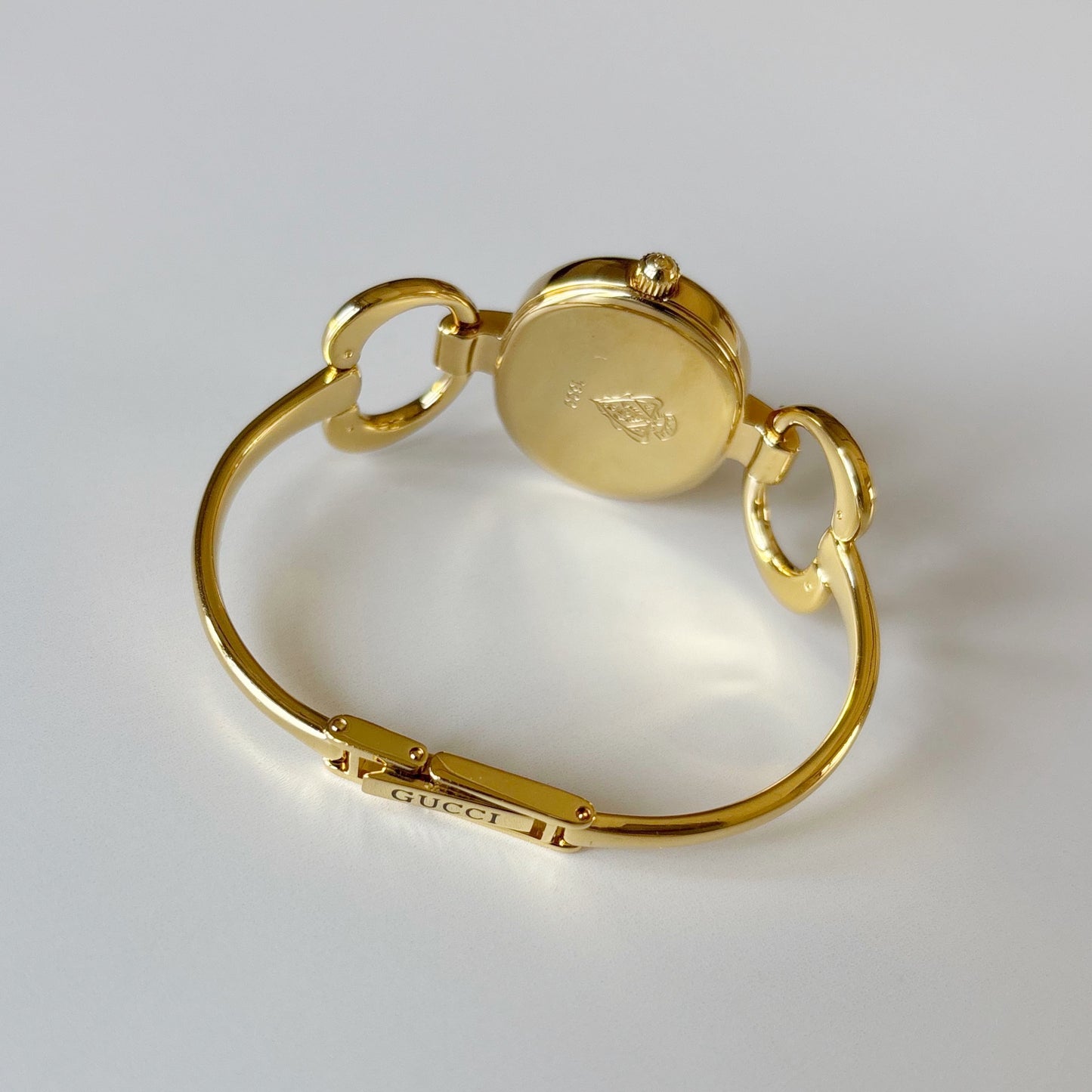 Gucci 1990s Oval Gold Dial Gold Plated Bangle Watch (Small)