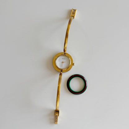 Gucci 1990s Interchangeable Bezel Gold Plated Bangle Watch with 12 bezels, case