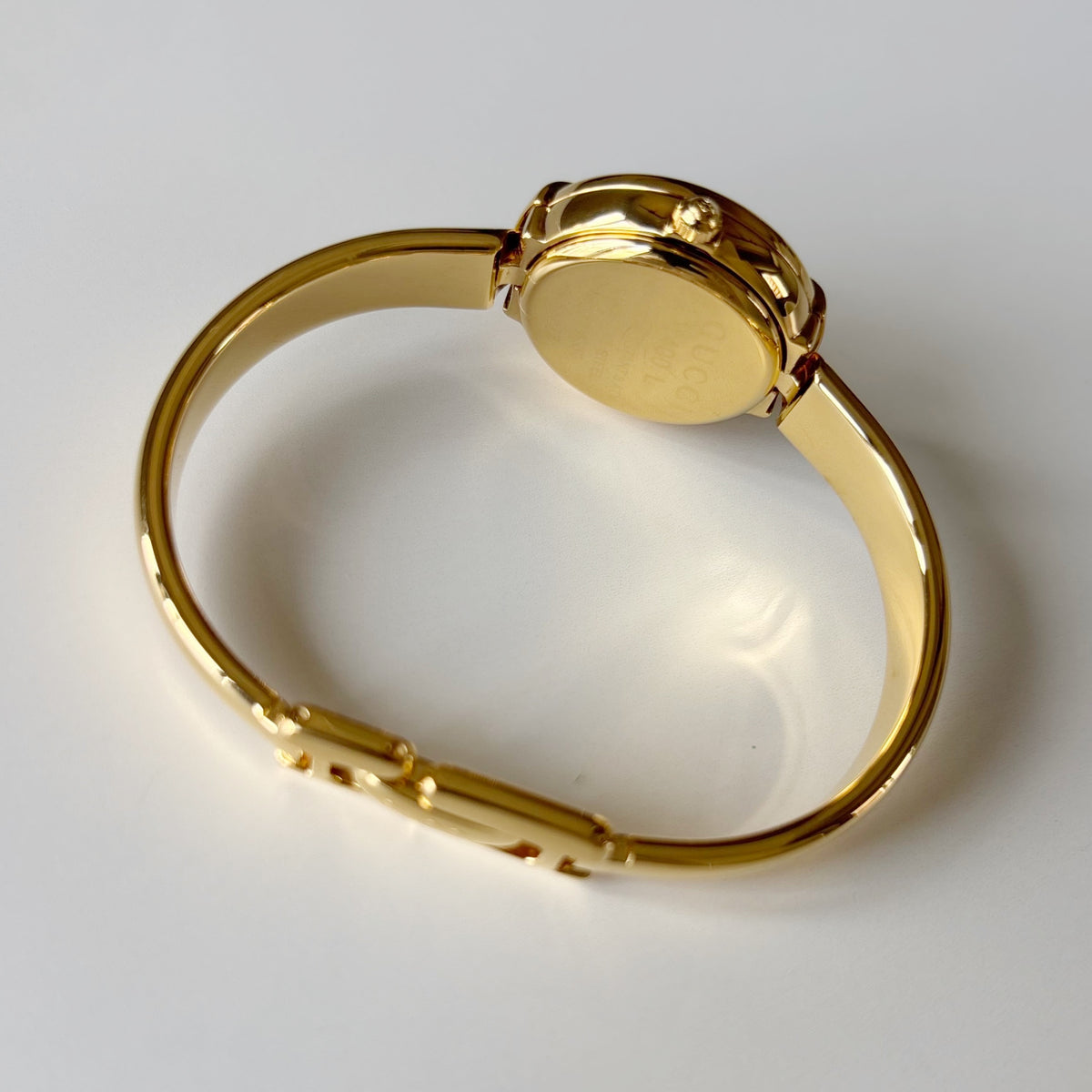 Gucci Round Dial Gold-Plated Bangle Watch