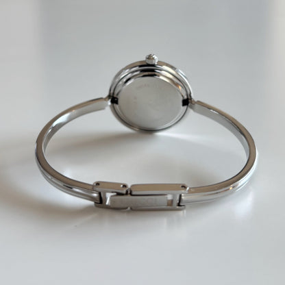 Gucci 1990s Interchangeable Bezel Stainless steel Bangle Watch with 12 bezels, case (Small)