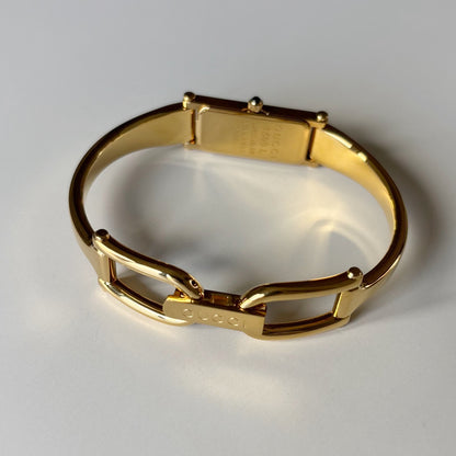 Gucci 1990s Black Rectangular Dial Gold Plated Bangle Watch