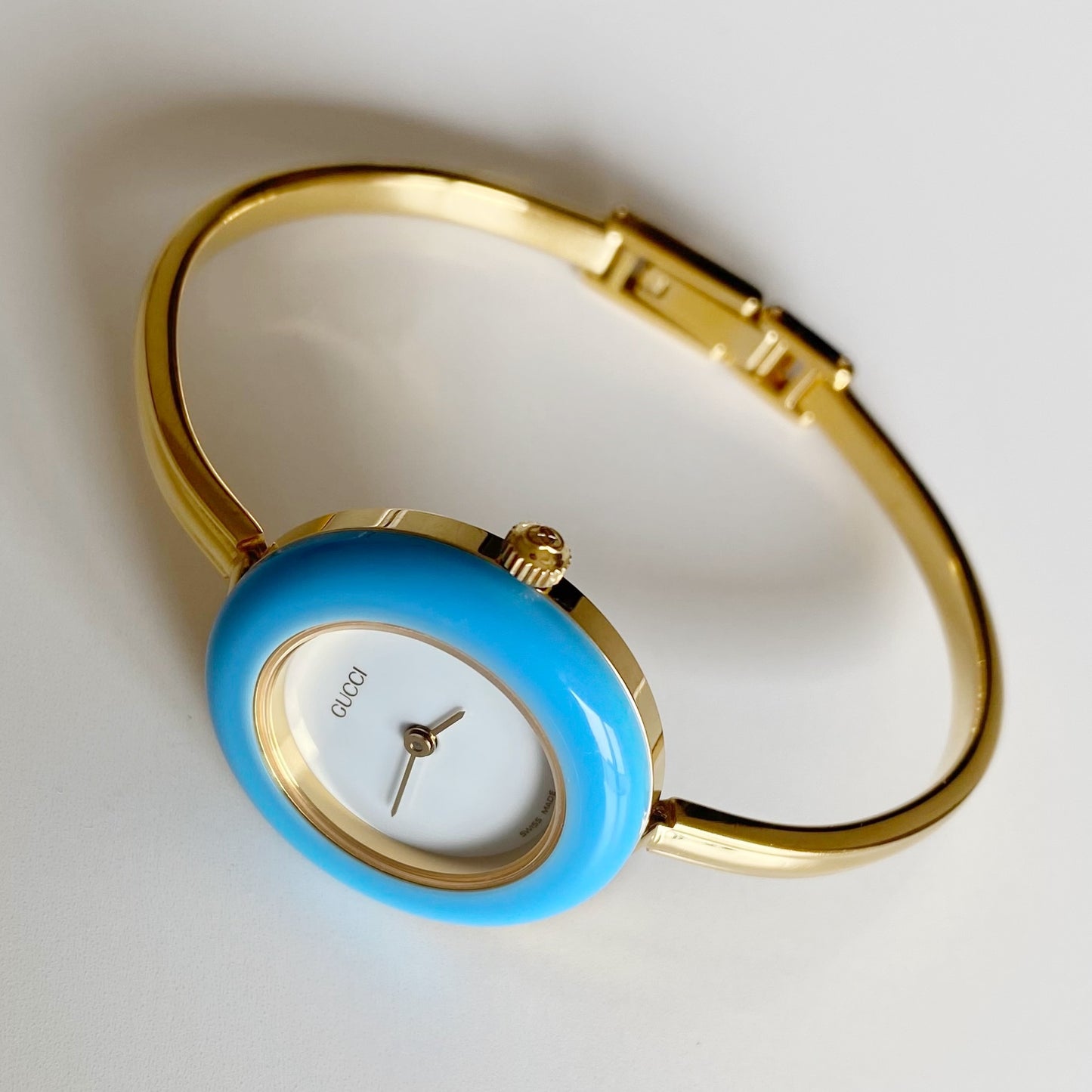 Gucci 1990s Interchangeable Bezel Gold Plated Bangle Watch with 12 bezels, case