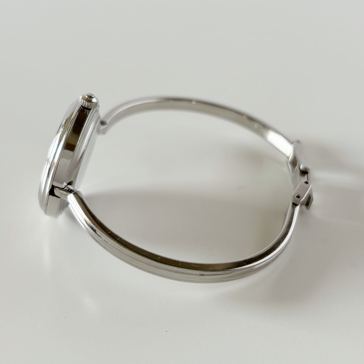 Gucci 1990s Interchangeable Bezel Stainless steel Bangle Watch with 12 bezels, case