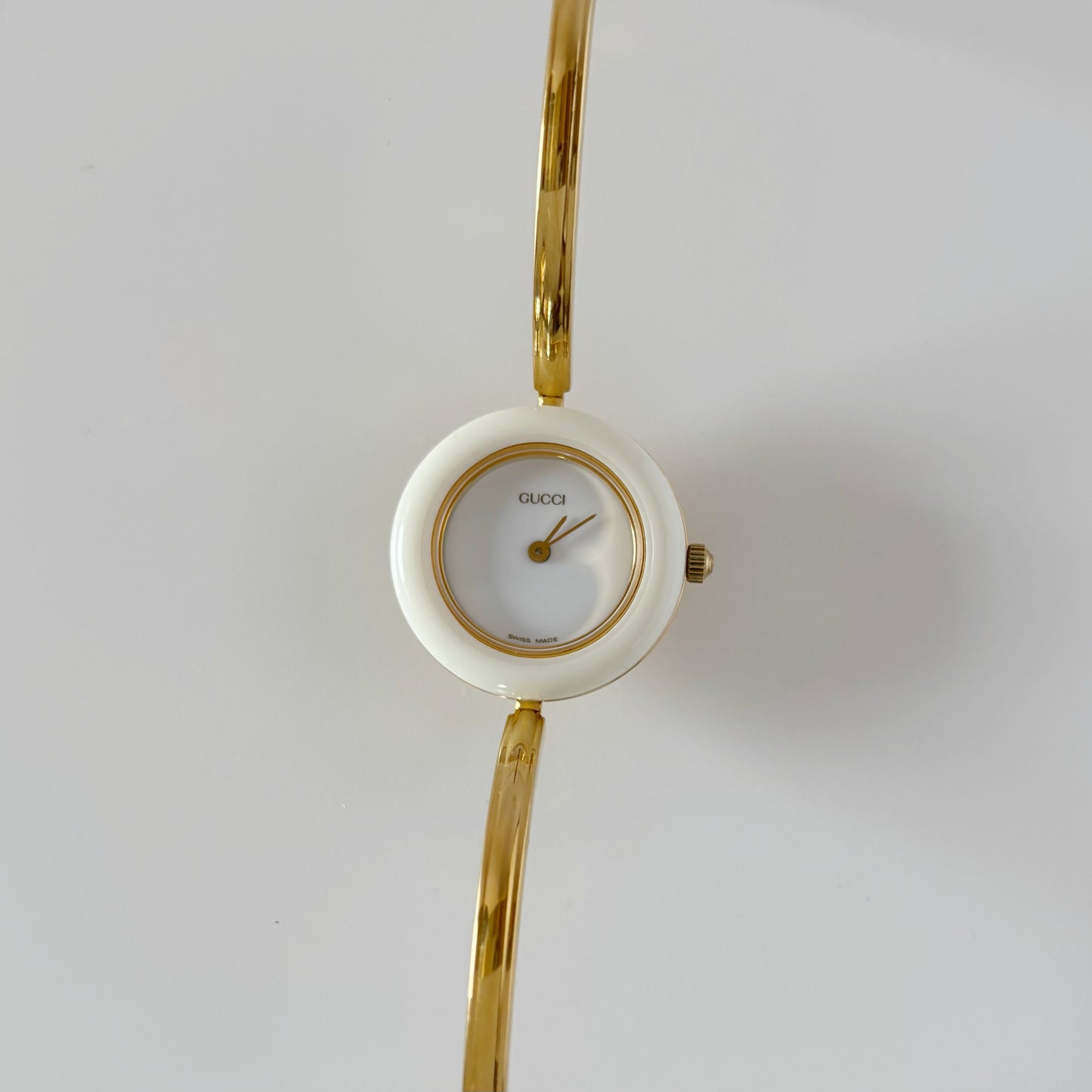 Gucci 1990s Interchangeable Bezel Gold Plated Bangle Watch with 12 bezels, case
