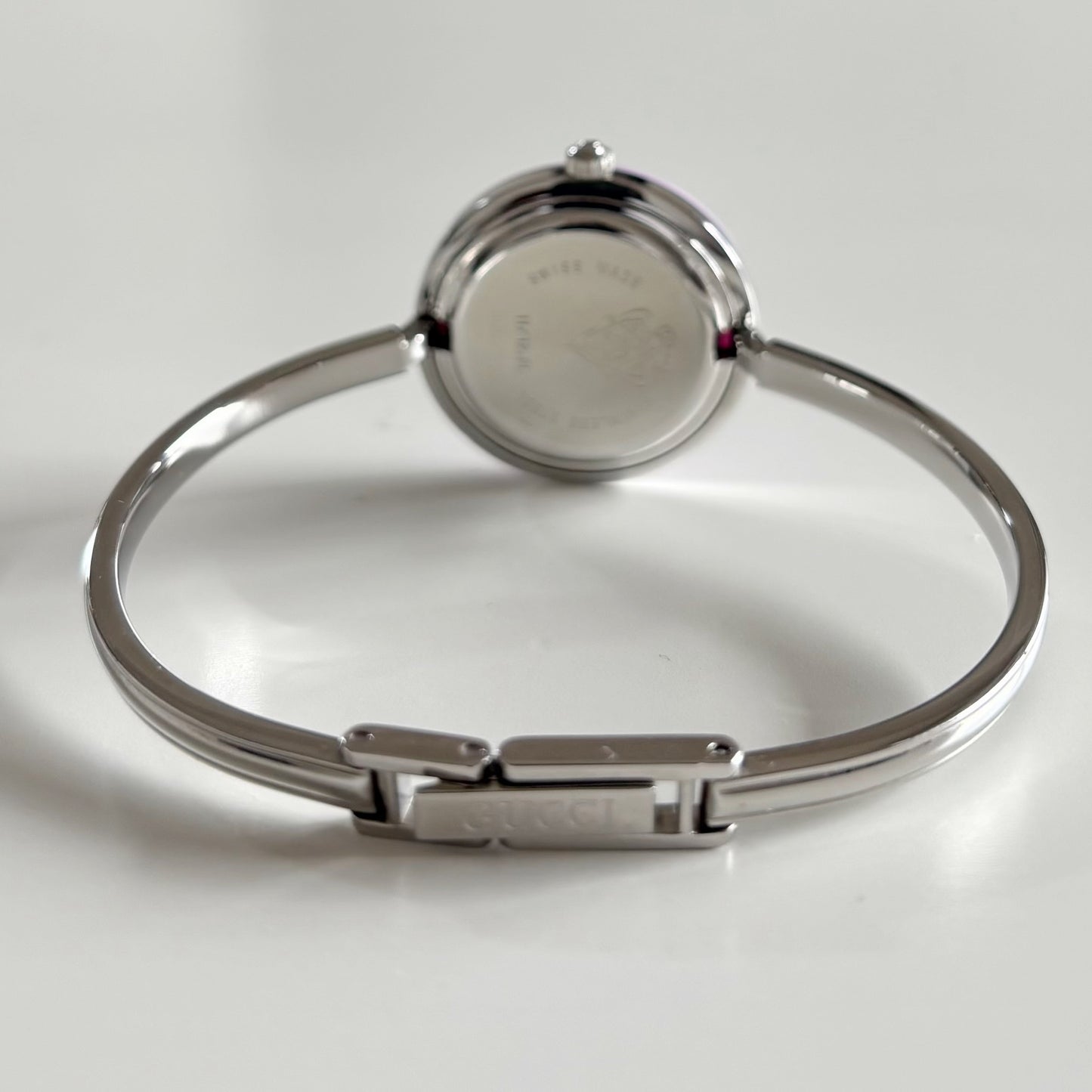 Gucci 1990s Interchangeable Bezel Stainless Steel Bangle Watch with 12 bezels, case