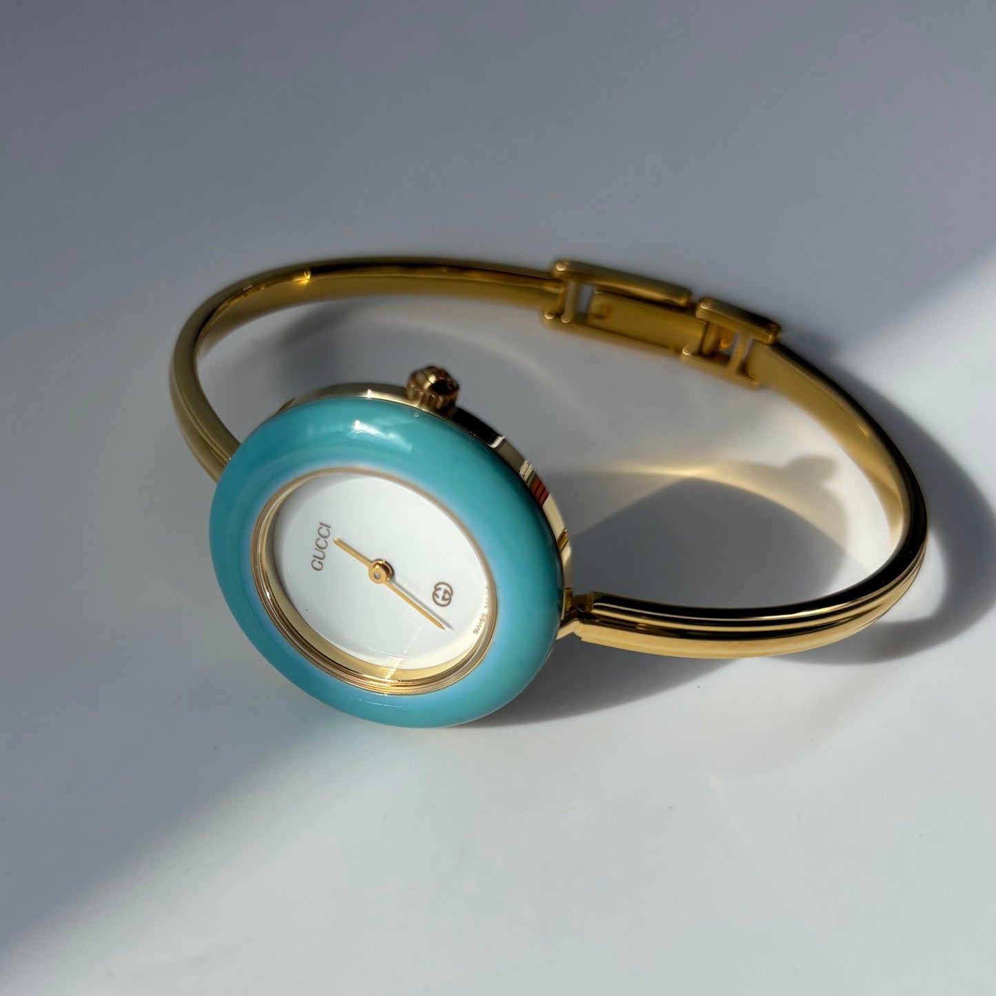 Gucci 1990s Interchangeable Bezel Gold Plated Bangle Watch with 12 bezels, case