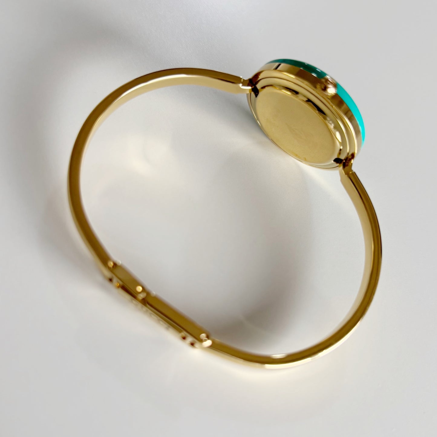 Gucci 1990s Interchangeable Bezel Gold Plated Bangle Watch with 12 bezels, case
