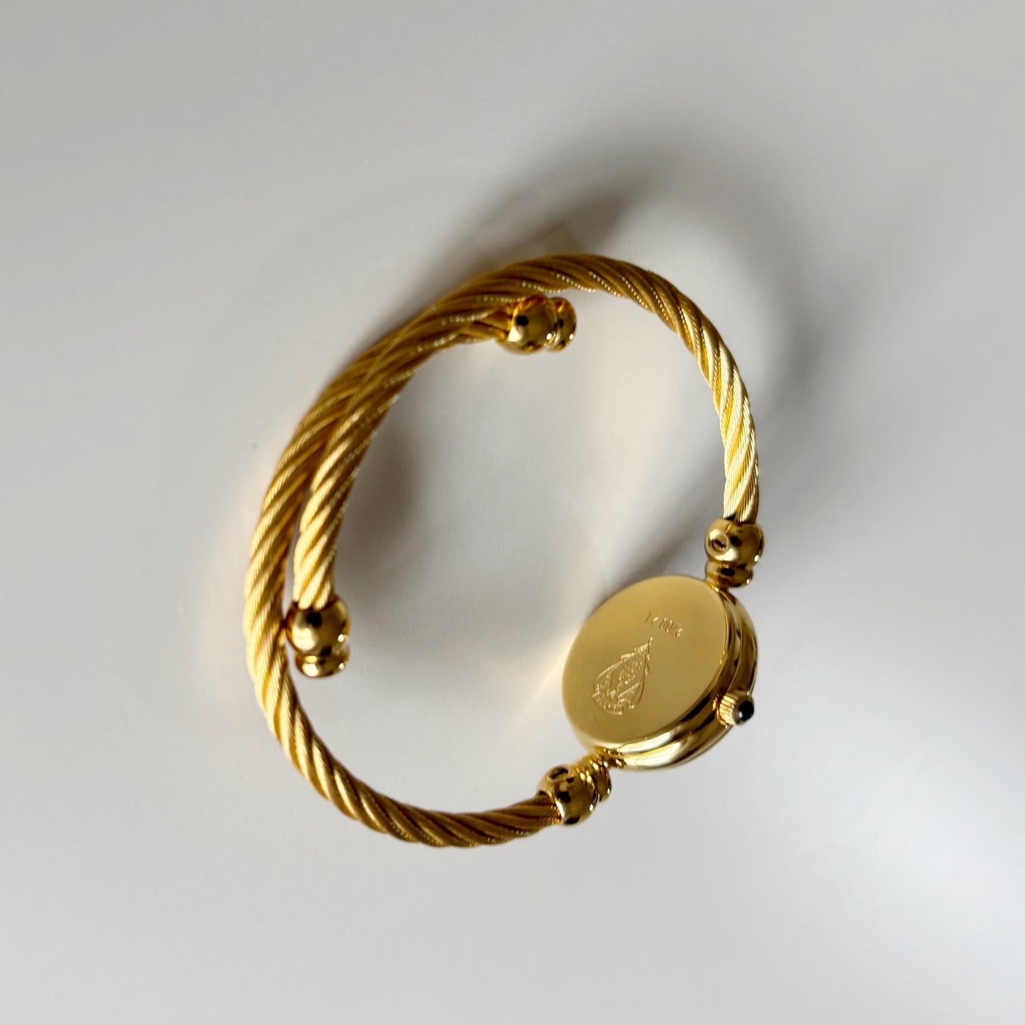 Gucci 1990s Black Dial Gold Plated Cable Band Bangle Watch