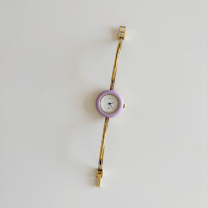 Gucci 1990s Interchangeable Bezel Gold Plated Bangle Watch with 12 bezels, case