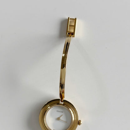 Gucci 1990s Interchangeable Bezel Gold Plated Bangle Watch with case, 12 bezels (Small)