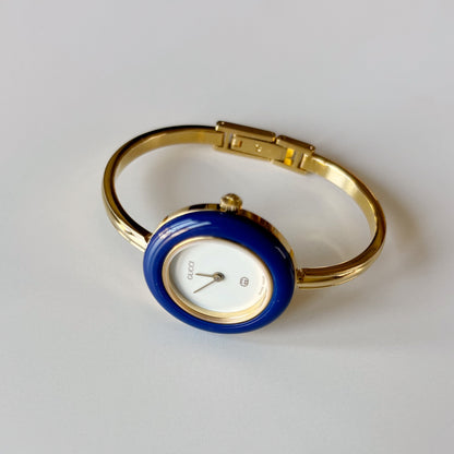 Gucci 1990s Interchangeable Bezel Gold Plated Bangle Watch with 12 bezels, case (Small)