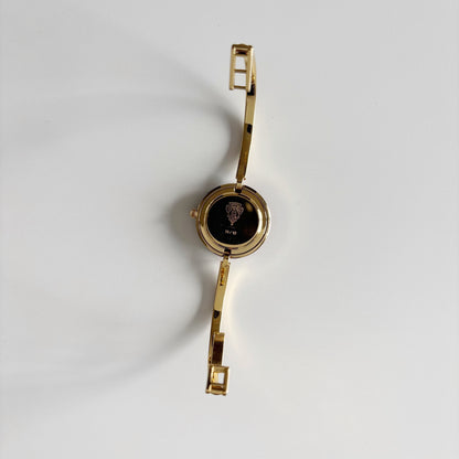 Gucci 1990s Interchangeable Bezel Gold Plated Bangle Watch with 12 bezels, case