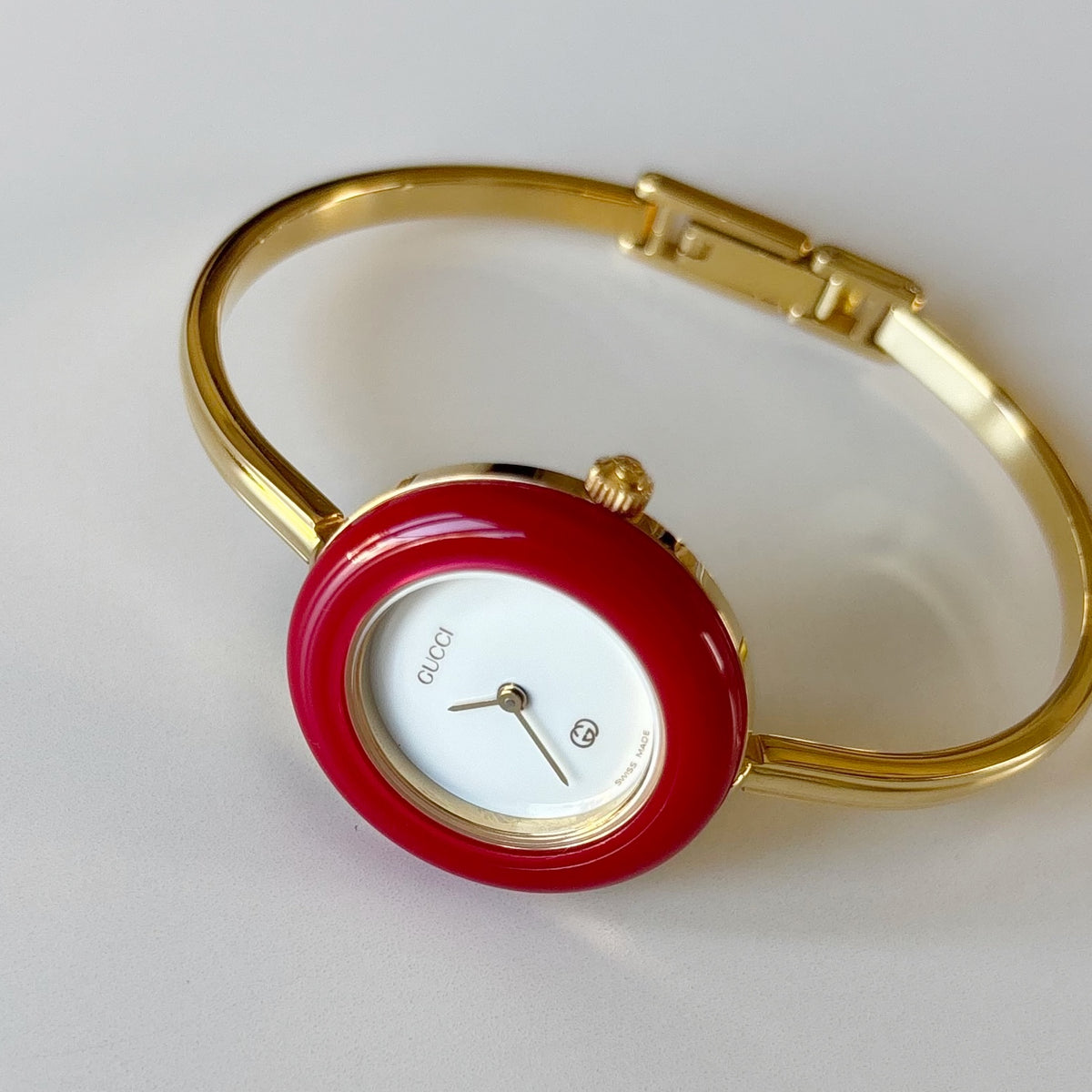 Gucci 1990s Interchangeable Bezel Gold Plated Bangle Watch with 12 bezels, case