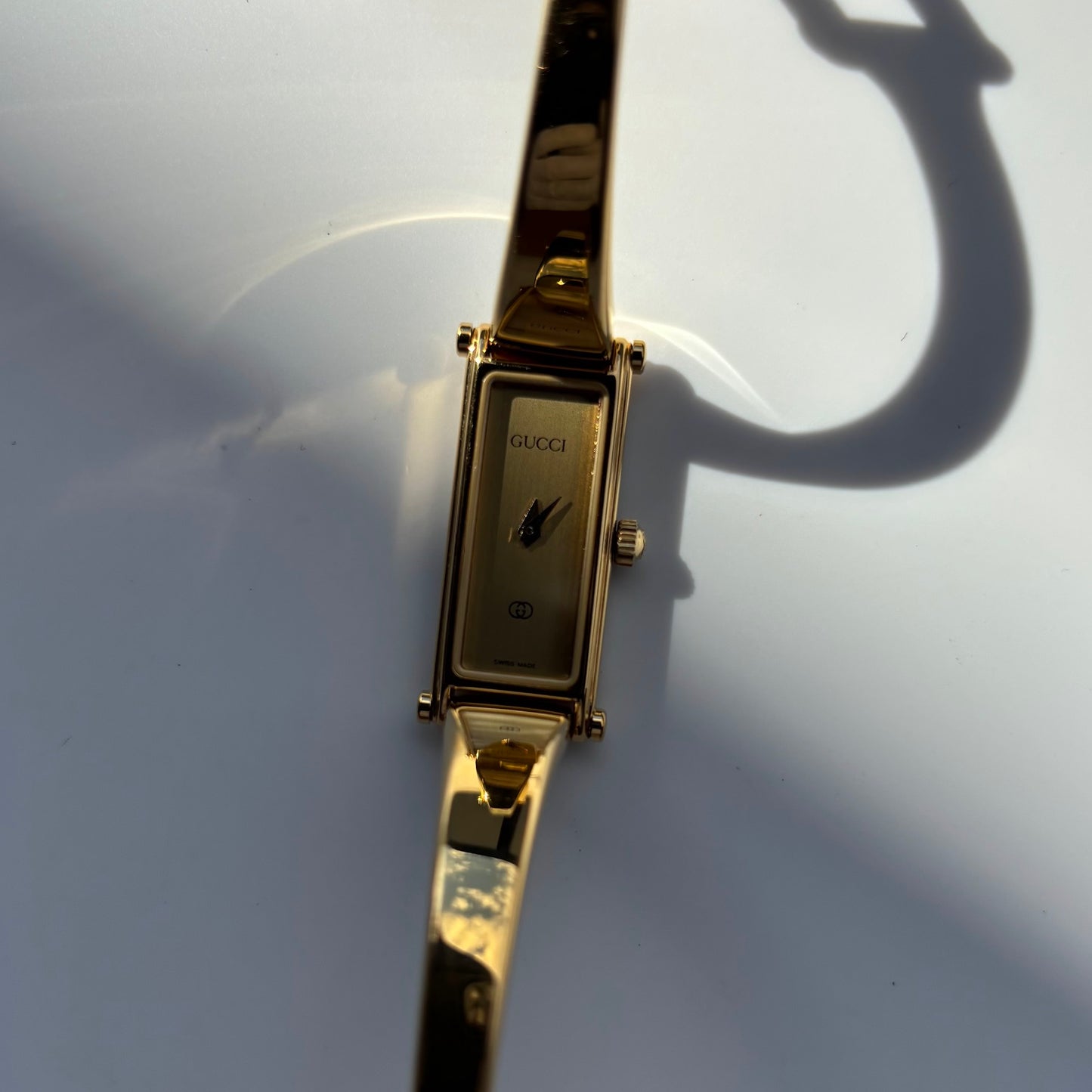 Gucci 1980s Rectangular Gold Dial Gold Plated Bangle Watch