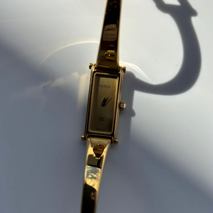 Gucci 1980s Rectangular Gold Dial Gold Plated Bangle Watch