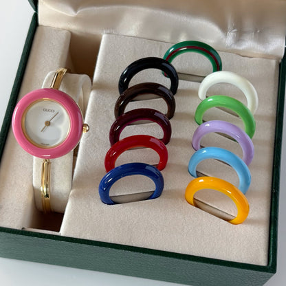 Gucci 1990s Interchangeable Bezel Gold Plated Bangle Watch with 12 bezels, case