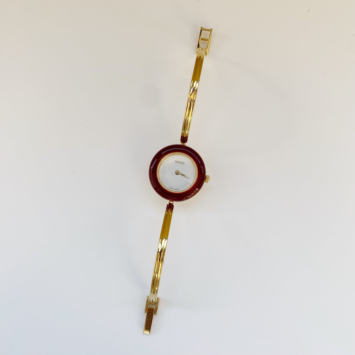 Gucci 1990s Interchangeable Bezel Gold Plated Bangle Watch with 12 bezels, case