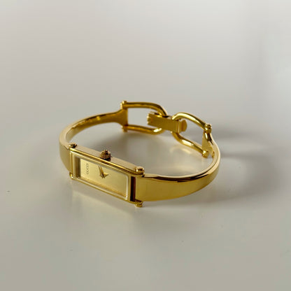 Gucci 1990s Gold Dial Rectangular Gold Plated Bangle Watch