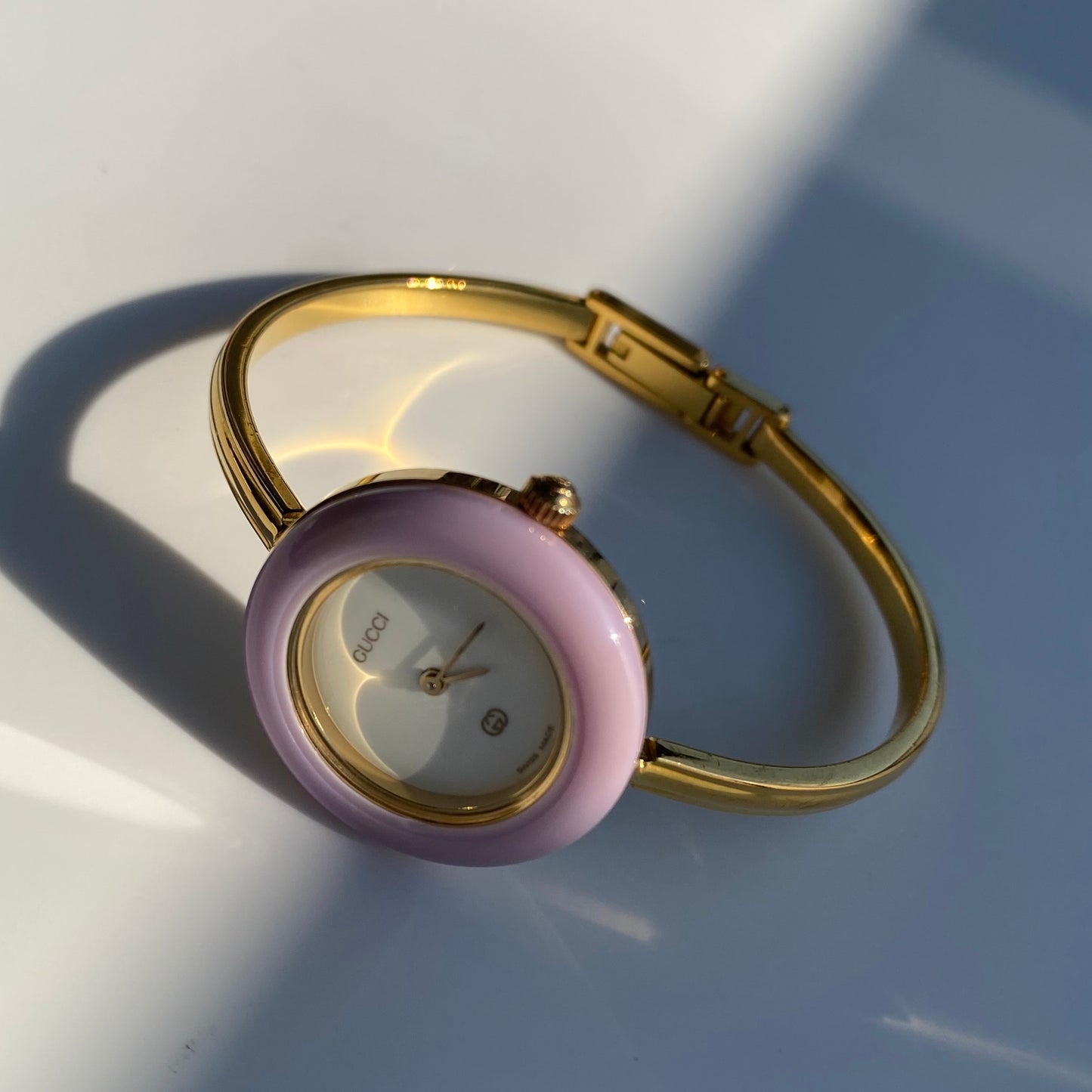 Gucci 1990s Interchangeable Bezel Gold Plated Bangle Watch with 12 bezels, case