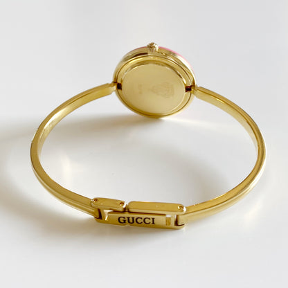 Gucci 1990s Interchangeable Bezel Gold Plated Bangle Watch with 12 bezels, case
