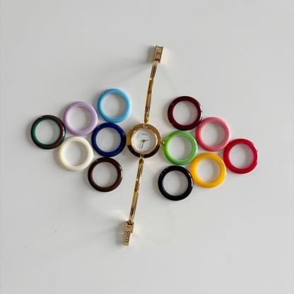 Gucci 1990s Interchangeable Bezel Gold Plated Bangle Watch with 12 bezels, case