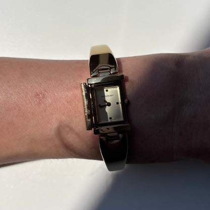Yves Saint Laurent 1990s Peek a boo Gold Plated Bangle Watch