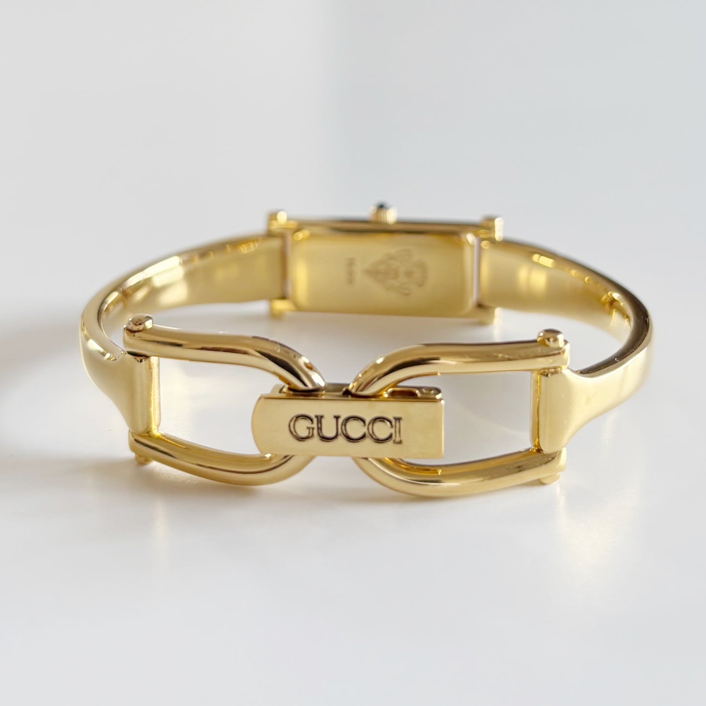 Gucci 1990s Black Dial Rectangular Gold Plated Bangle Watch