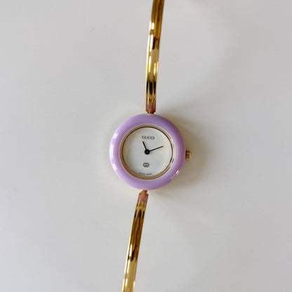 Gucci 1990s Interchangeable Bezel Gold Plated Bangle Watch with 12 bezels, case