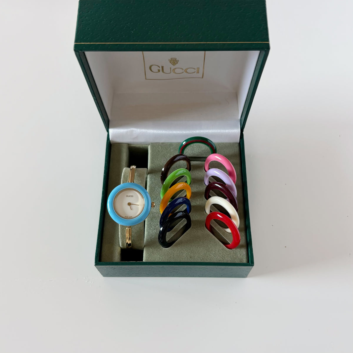 Gucci 1990s Interchangeable Bezel Gold Plated Bangle Watch with 12 bezels, case (Small)