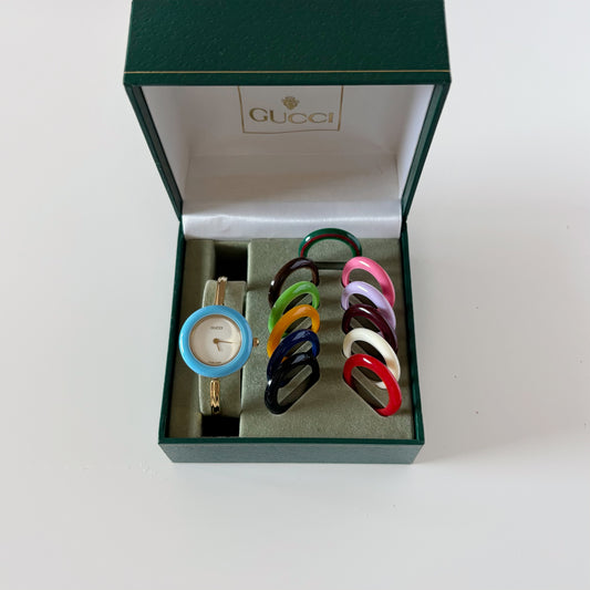 Gucci 1990s Interchangeable Bezel Gold Plated Bangle Watch with 12 bezels, case (Small) (8/30)