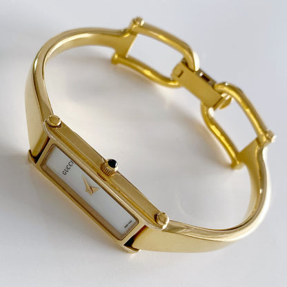 Gucci 1990s Seashell Dial Rectangular Gold Plated Bangle Watch